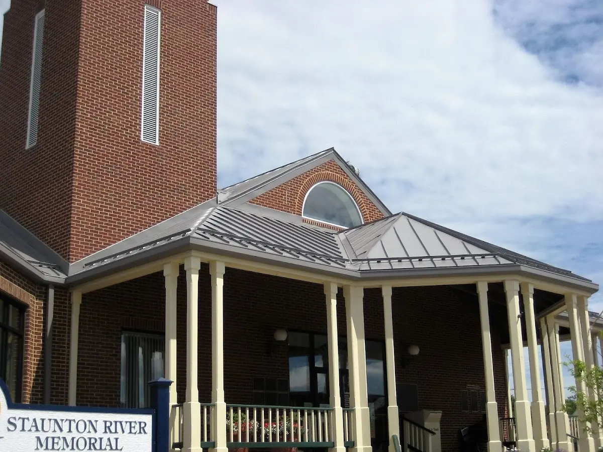 Skilled roofing craftsmen working on a residential roof in Perrowville